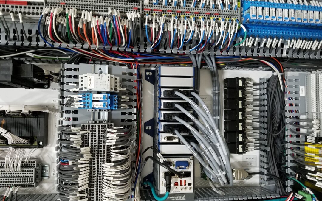 What is the Purpose of an Industrial Control Panel in an Industrial Manufacturing Setting?